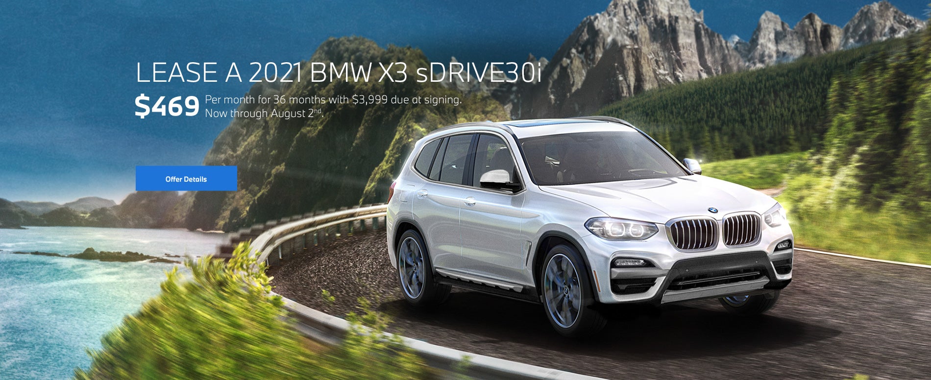 White X3 going around a bend on oceanside highway