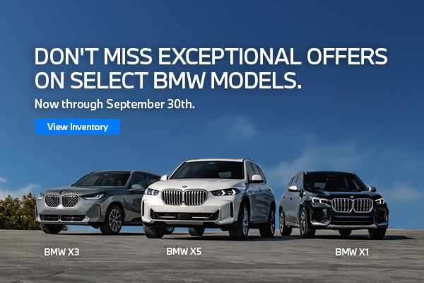 BMW X3, X5, & X1 parked on the street