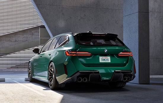Green BMW M5 Touring parked in garage. | Weatherford BMW of Berkeley in Berkeley CA