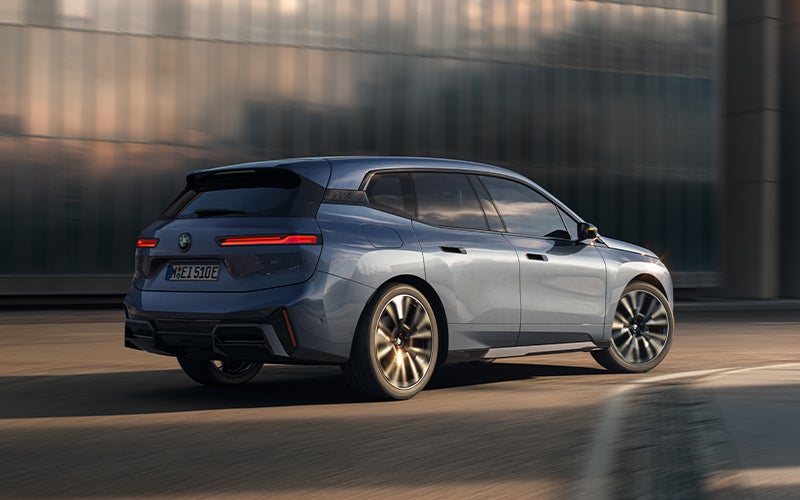 The BMW iX driving with the front wheel turned. | Weatherford BMW of Berkeley in Berkeley CA